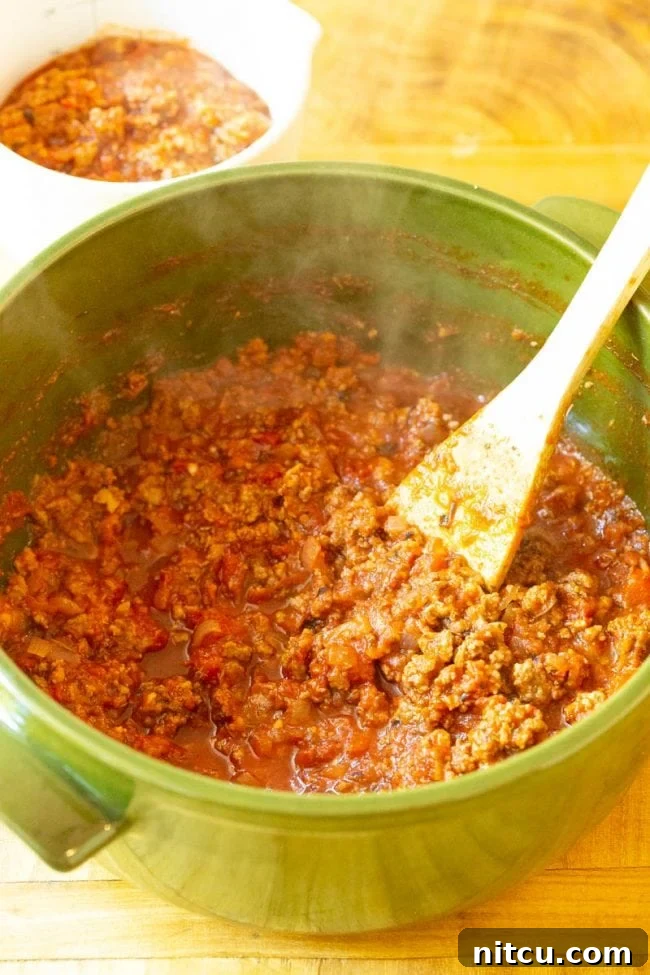 Prepared spaghetti noodles in a pot.