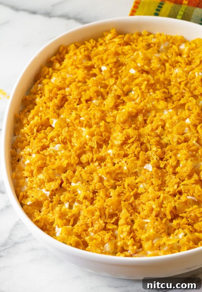 Signature Social Spuds 11 Potato mixture topped with corn flakes.