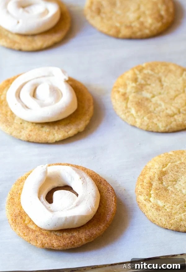 sandwich cookies Snickerdoodle Sandwich Cookie Recipe #ASpicyPerspective #snickerdoodle #cookies #holiday #christmas #whoopiepie