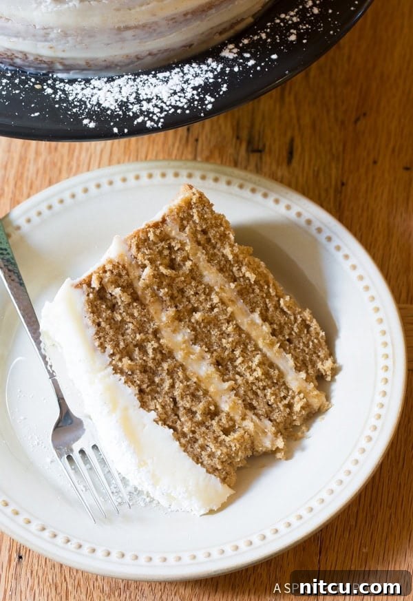 Decadent Cinnamon Dolce Latte Cake with Mascarpone Frosting close-up, highlighting the smooth frosting.