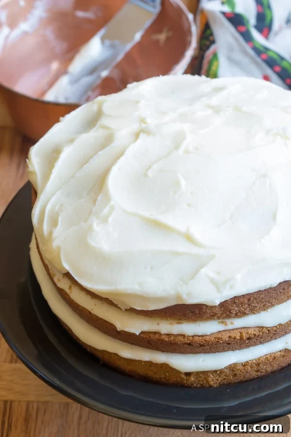 Perfect Cinnamon Dolce Latte Cake with Mascarpone Frosting, decorated for the holidays.
