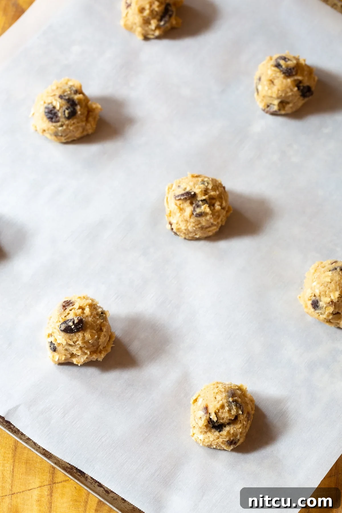 Scoops of cookie dough on a pan ready to bake!