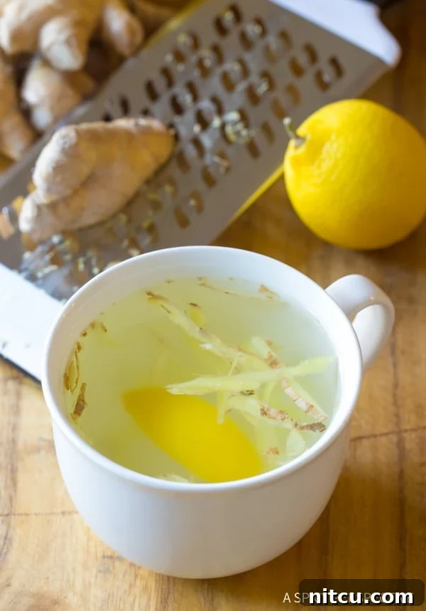 Sunshine Ginger Elixir 5 A beautifully presented cup of Lemon Ginger Tea, inviting and warm.