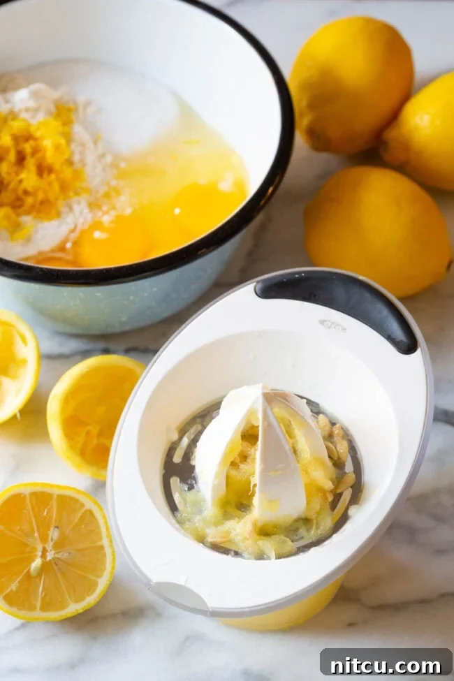 Juicing #ASpicyPerspective #Lemon #Bars #LemonBars #LemonSquares #CookieCrust #WhiteChocolate #Spring #Dessert #Easter Ingredients for white chocolate lemon bars - juice fresh lemon