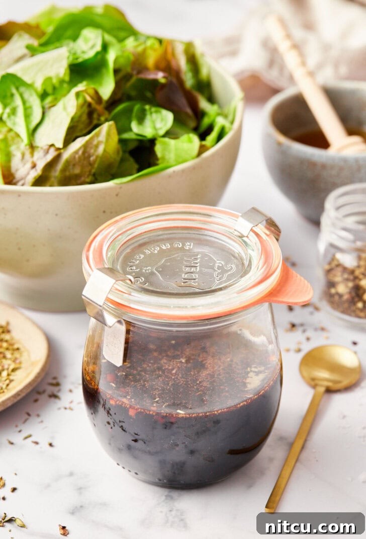 Elevate Your Salad with Homemade Balsamic Vinaigrette 9 how to make balsamic dressing - close up of ingredients in jar