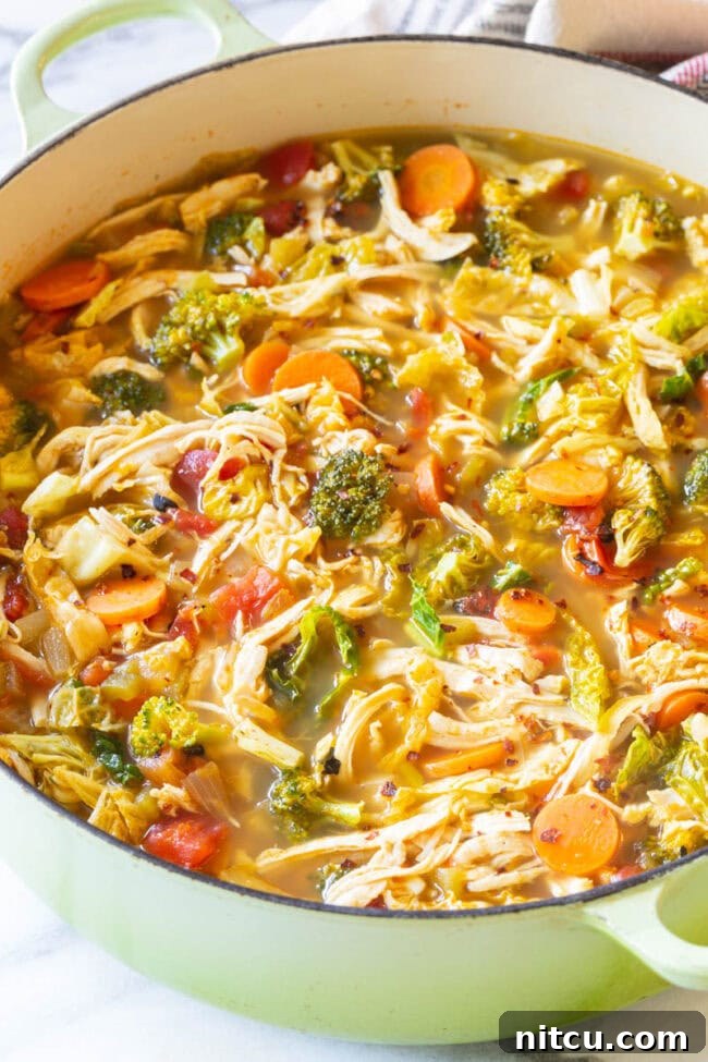 Southwest chicken detox soup in a large Dutch oven pot.