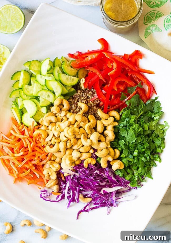 Vibrant Thai Quinoa Salad 4 Healthy Thai Quinoa Salad toppings piled in a bowl, ready for tossing