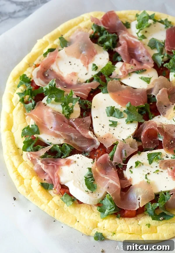 Light & Low Carb Cloud Pizza 9 Toppings placed on top of cloud bread pizza dough before being baked again.
