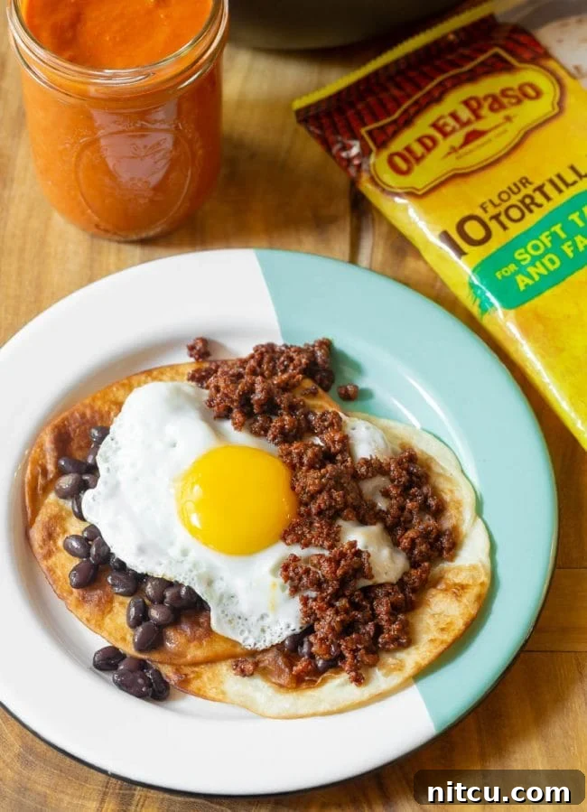 Hearty Ranch Eggs with Zesty Salsa 11 A freshly cooked sunny-side up egg in a skillet.