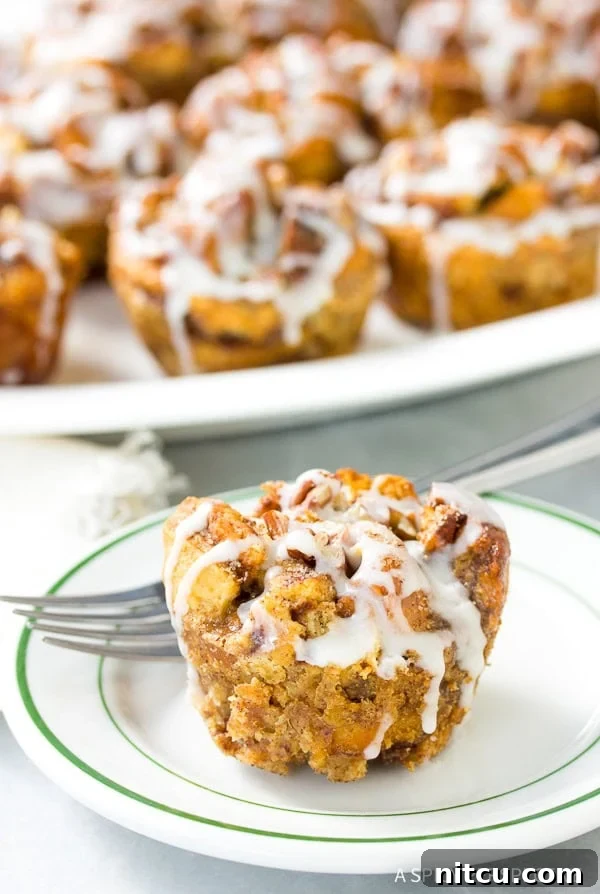 Sticky Bun Bread Pudding Muffin Cups 3 Perfectly baked Cinnamon Roll Bread Pudding Muffins with glaze