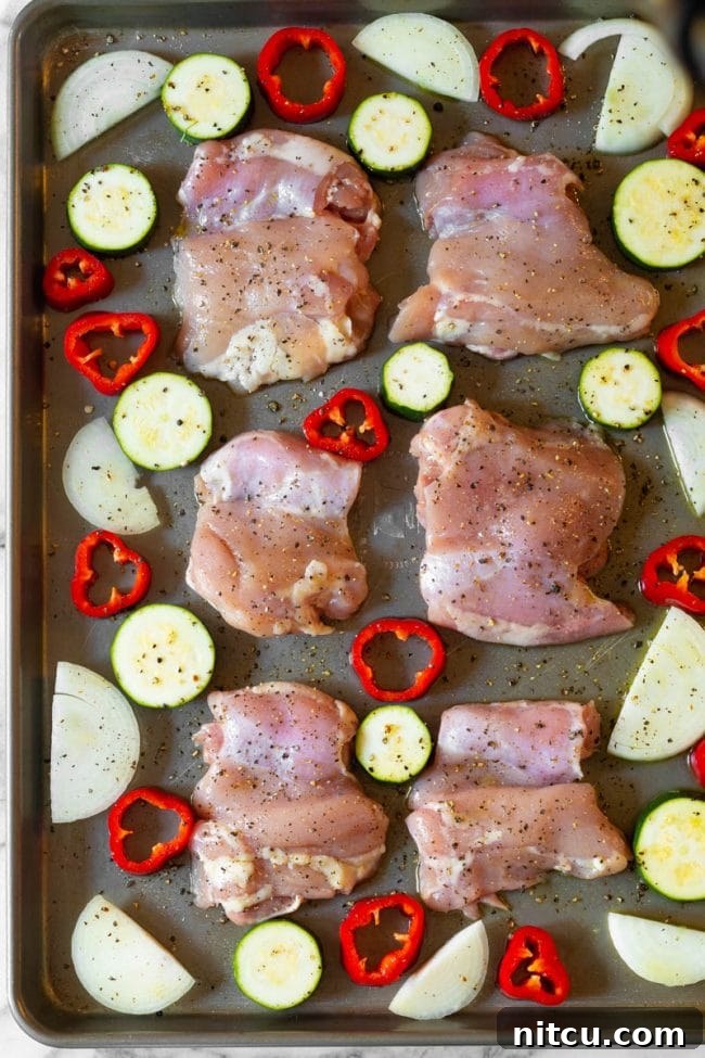 One-Pan Chicken Cacciatore 5 Freshly chopped sweet onions and red peppers, ready for roasting on a sheet pan