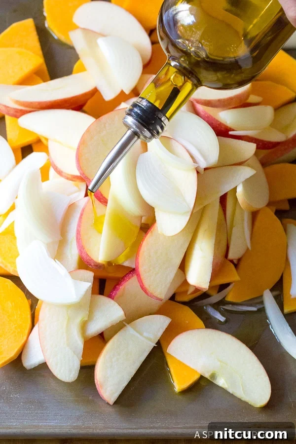 Making Chicken Sausage Apple Squash Sheet Pan Dinner