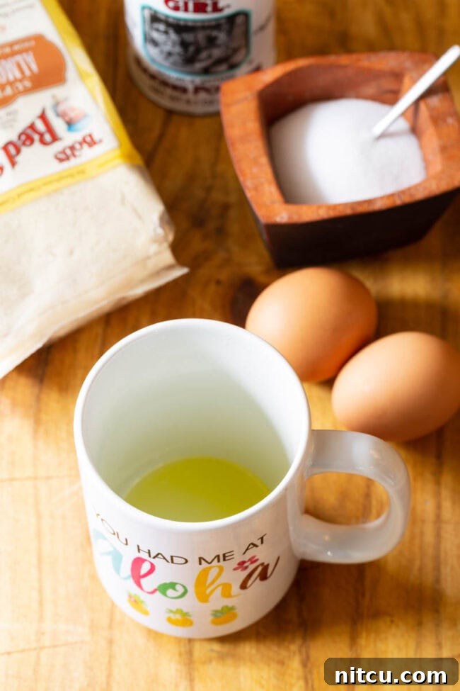 Magic Mug Low Carb Bread Recipe #ASpicyPerspective #Paleo #Ketogenic #SugarFree #DairyFree #GrainFree #GlutenFree Oiled mug.
