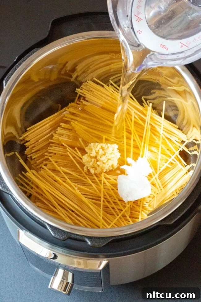 Zesty Instant Pot Bang Bang Shrimp Pasta 4 Making Instant Pot Bang Bang Shrimp Pasta Recipe