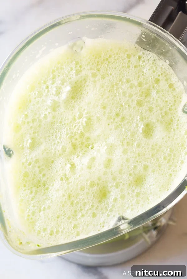 Crisp Cucumber Cooler 6 Agua fresca in the blender after being blended.