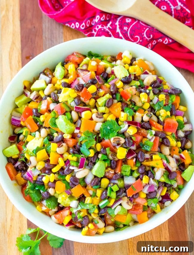 Freshly prepared cowboy caviar salad, mixed and ready.