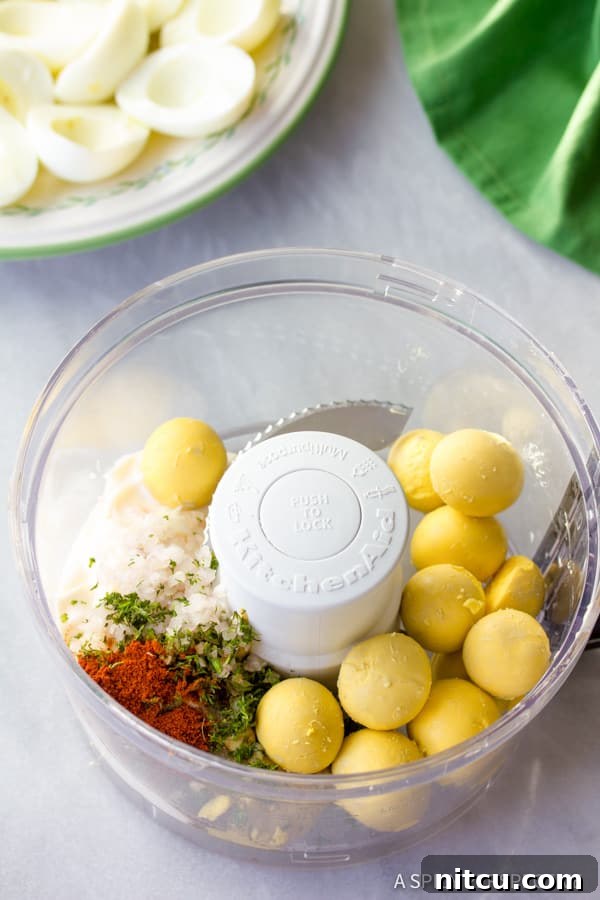 Heavenly Deviled Eggs 6 Deviled Eggs ingredients in the food processor for a creamy filling