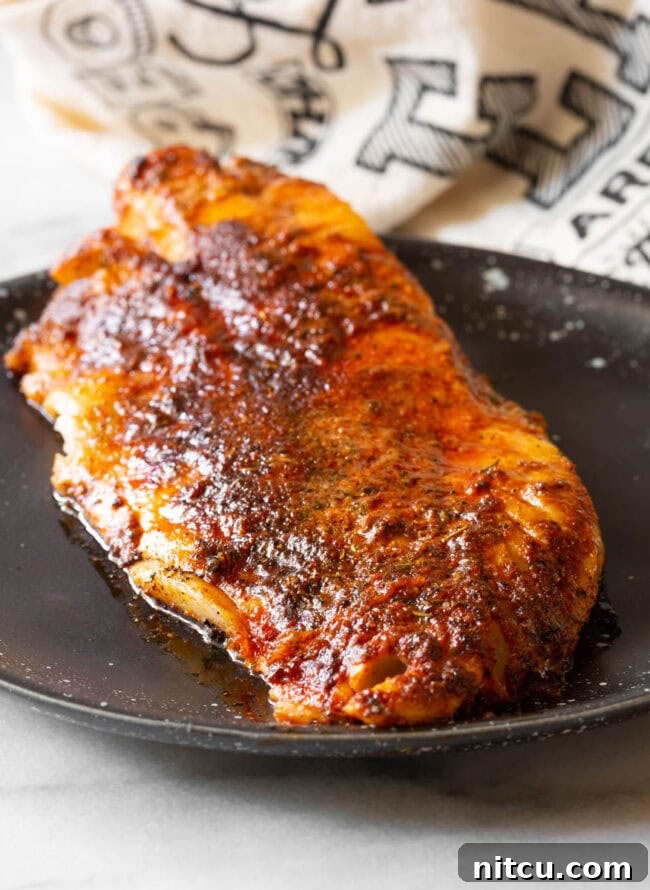 Close-up shot of the finely ground homemade blackened seasoning, highlighting its rich color and texture.