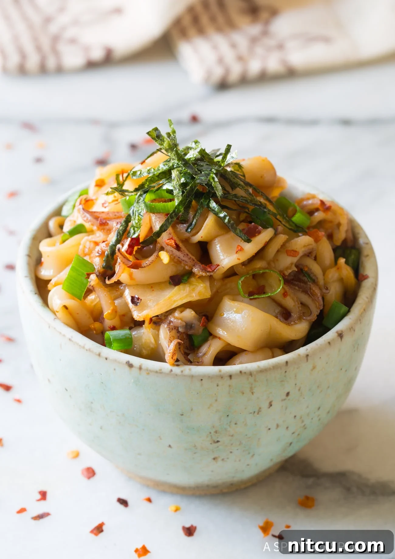 Vibrant Hawaiian Tako Poke 2 Simple Hawaiian Tako Poke Recipe (Octopus or Squid!) in a white bowl