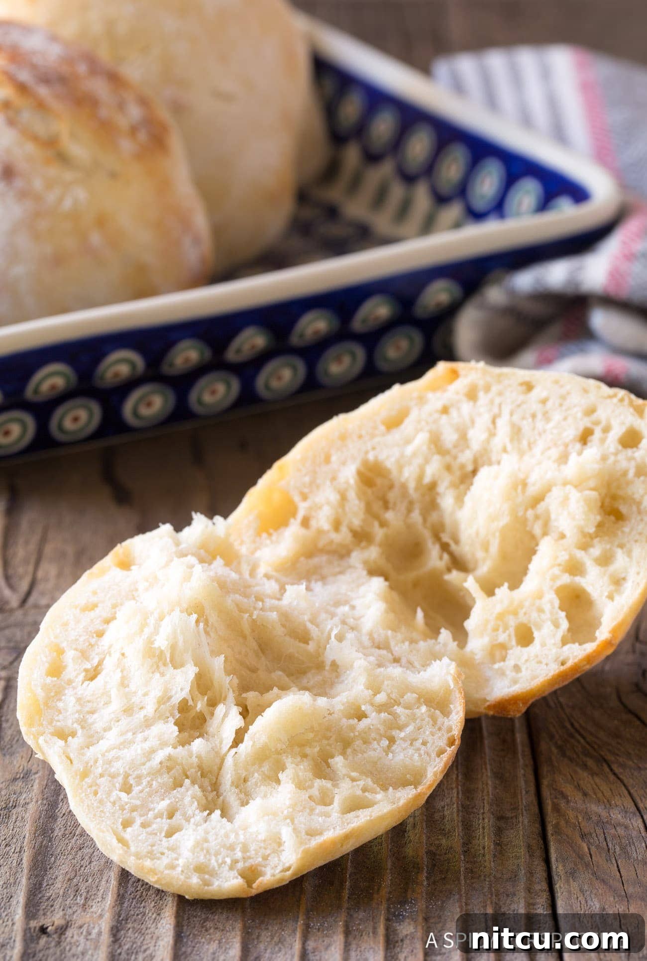 Pillowy Croatian Lepinja: Authentic Flatbread Recipe 3 Perfect Authentic Croatian Bread Recipe - open so the air bubble are apparent.
