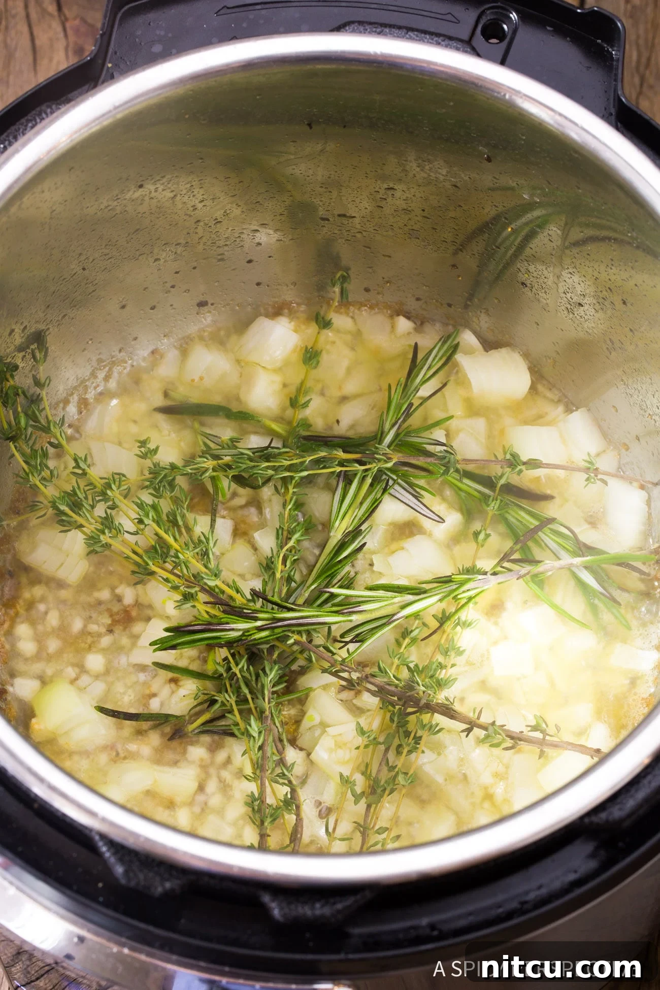 Herbed chicken orzo in a pressure cooker