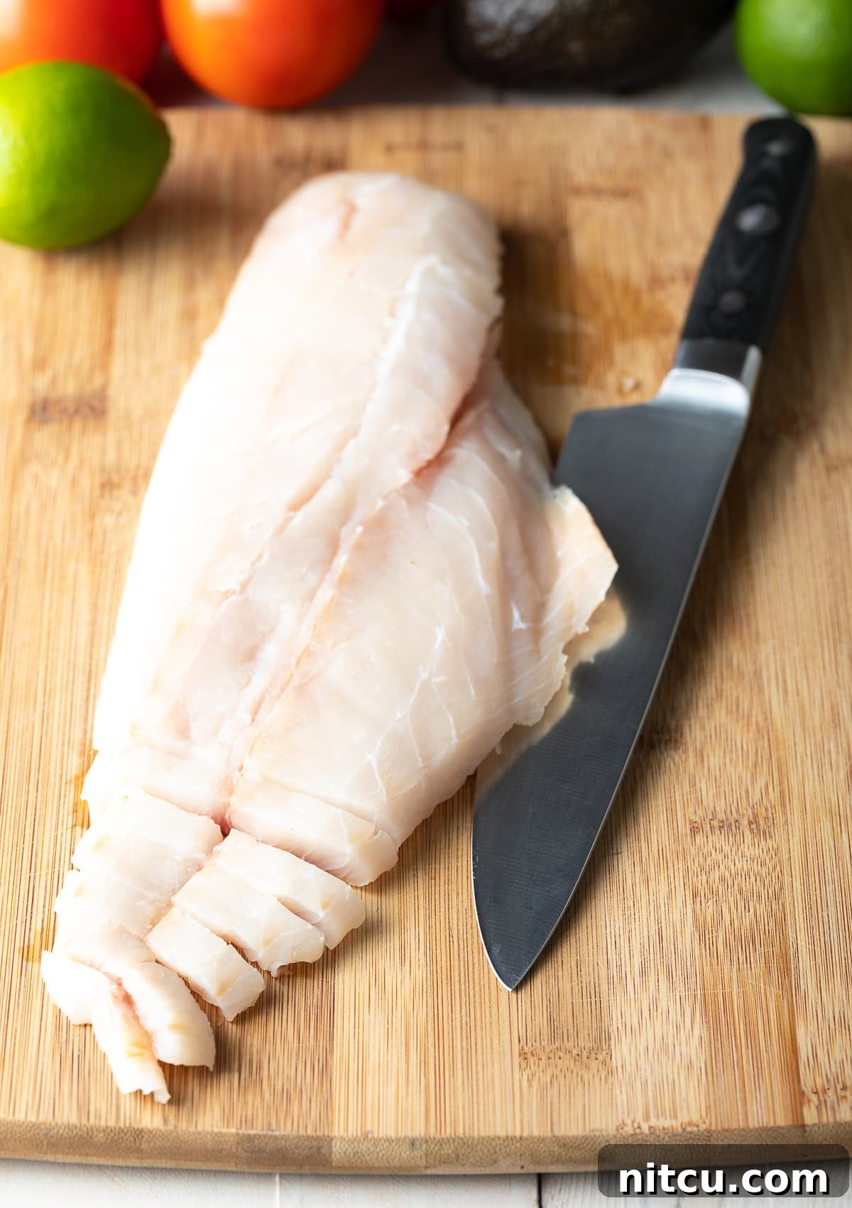 Fresh fish on cutting board for Ceviche de Pescado