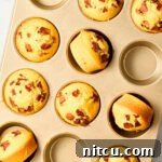 Golden Corn Muffins with Crispy Bacon 13 Corn Muffins Recipe - warm cornbread muffins in pan with bacon and maple syrup