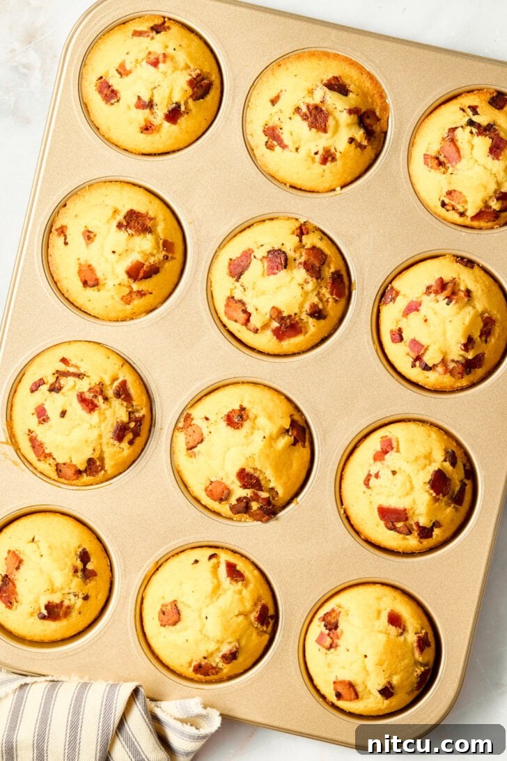 Golden Corn Muffins with Crispy Bacon 10 Warm corn muffins with crispy bacon in a baking pan