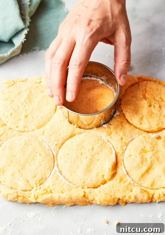 Rustic Strawberry Cornmeal Shortcake 8 How to Make Strawberry Shortcake - cutting dough