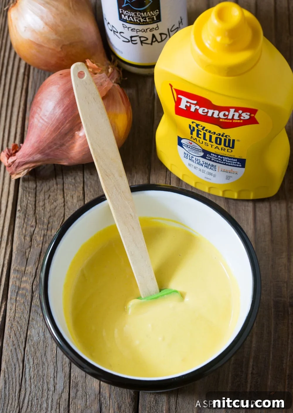 Mustard-Seafood-Sauce A collection of ingredients necessary for making the mustard seafood dipping sauce, neatly arranged.