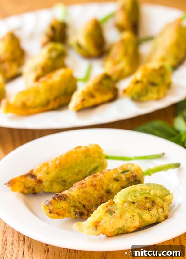 Artisanal Stuffed Squash Blossoms 8 Crispy Market Stuffed Squash Blossoms Recipe, close-up of the perfectly fried appetizer.