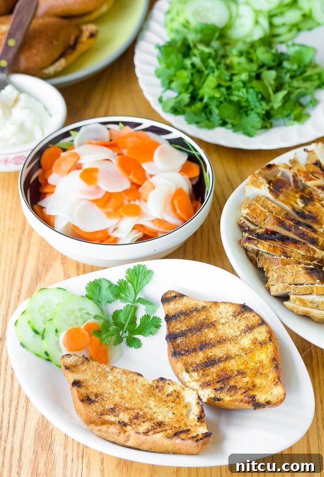 Vietnamese Baguette Masterpiece 5 Banh Mi sandwich recipe with grilled bread on plates, ready for toppings