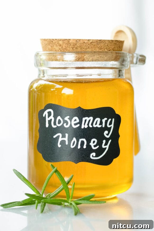 Honey Elixirs 2 Infused Honey - Small glass container filled with honey and labeled 'rosemary honey'