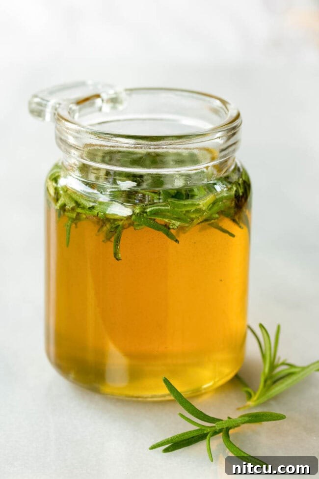 Honey Elixirs 6 Cute little jar filled with honey and rosemary.