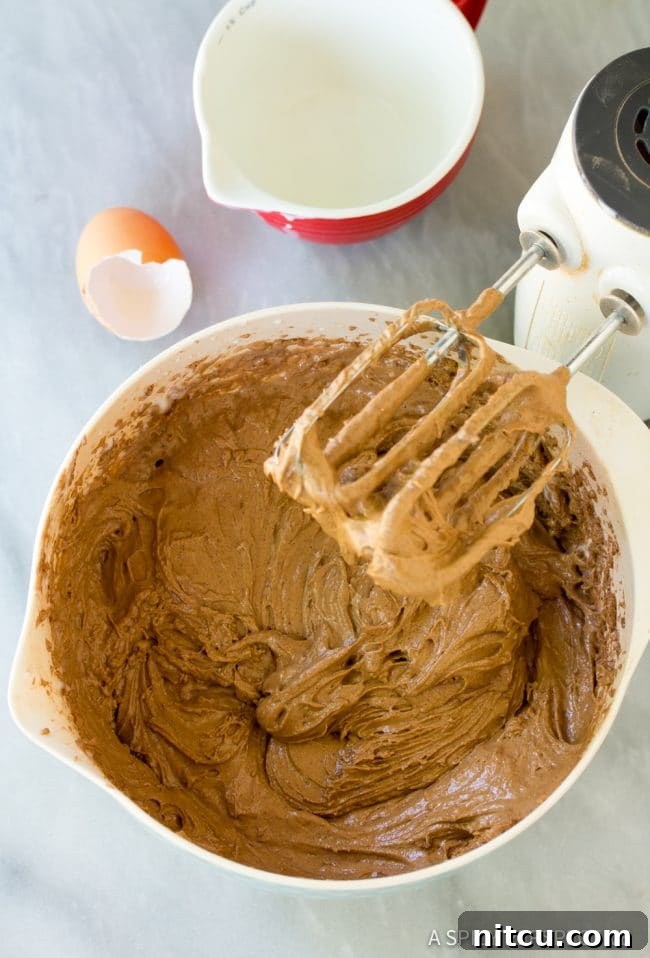 Impossible Chocoflan Cake 5 Preparing the Chocoflan Impossible Cake batter ingredients.