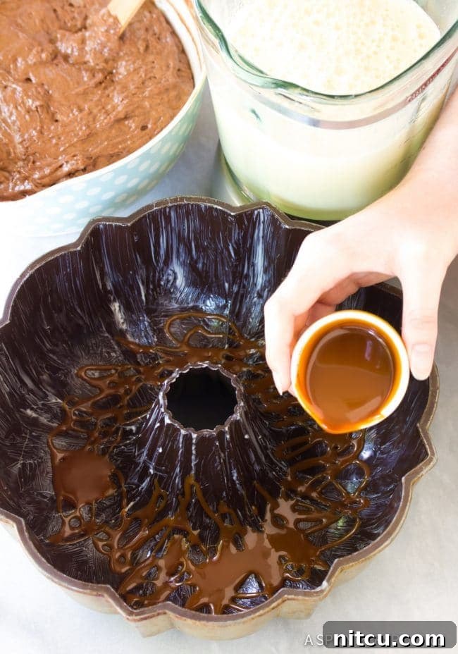 Impossible Chocoflan Cake 6 Drizzling caramel sauce into the bottom of a greased bundt pan for Chocoflan.