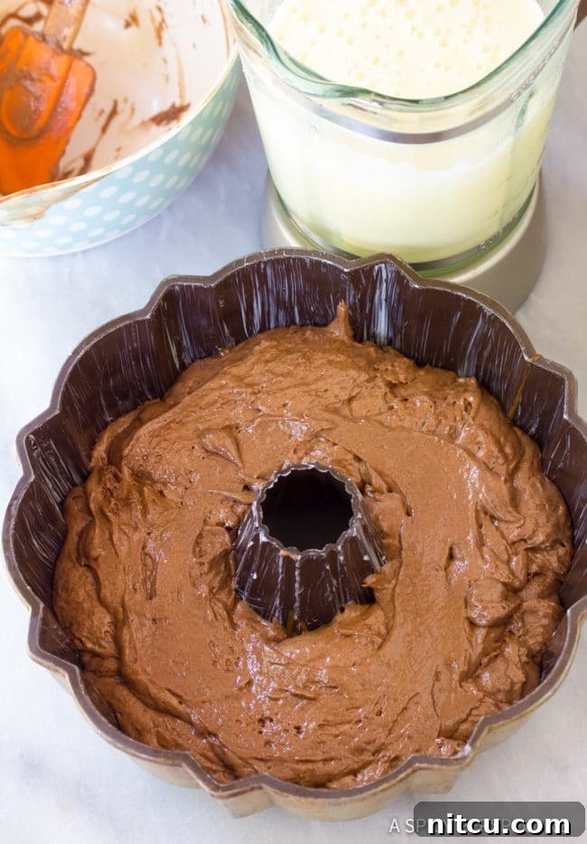 Impossible Chocoflan Cake 7 Assembling layers for Chocoflan: cake batter and flan mixture.