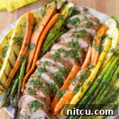 Flame-Kissed Pork Tenderloin with Bright Chimichurri and Rustic Roast Vegetables 11 Healthy Grilled Pork Tenderloin with Chimichurri and Roasted Vegetables