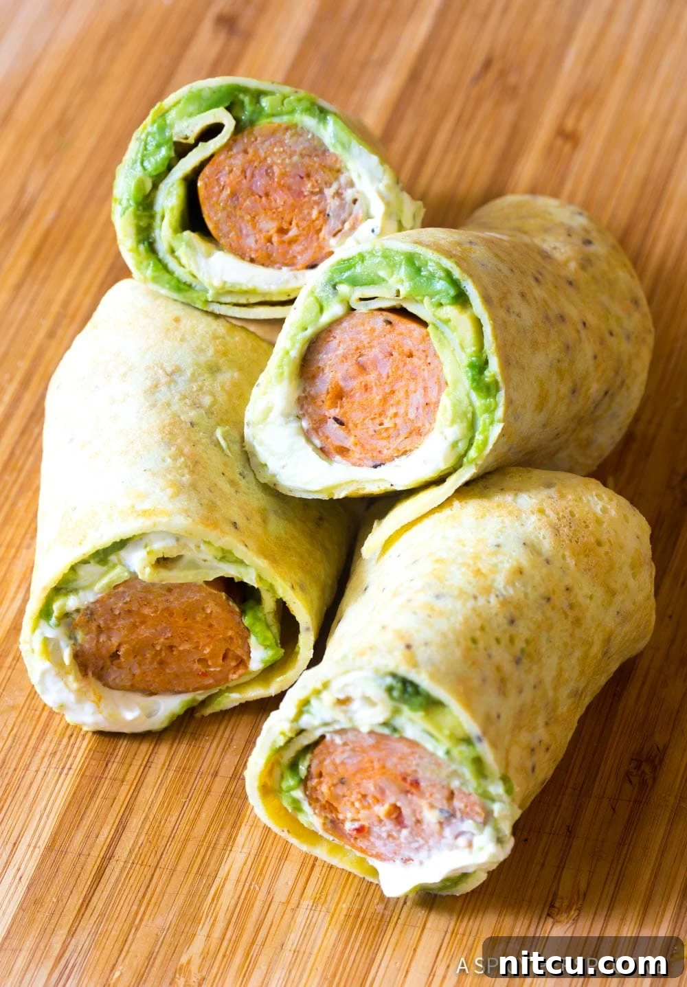 Quick Keto Egg Wraps 9 Breakfast egg wraps cut in half and stacked on top of each other.