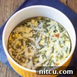 The finished Instant Pot Keto Crustless Quiche in its souffle dish, ready for serving.