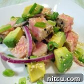 Freshly seared ahi tuna and avocado salad with zesty lime dressing.