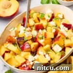 Refreshing Peach and Basil Salad 7 Peach Salad with basil and goat cheese on plates