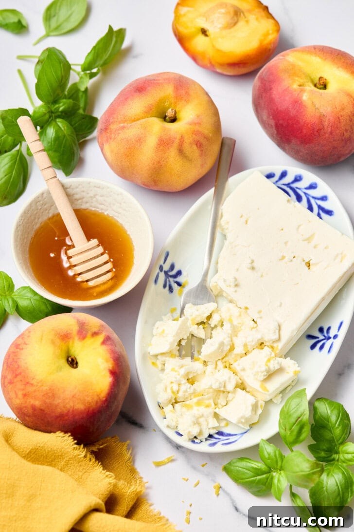 Fresh Peach Salad Ingredients Close-up of fresh peach salad ingredients, including ripe peaches, green basil leaves, and creamy goat cheese, ready for preparation.