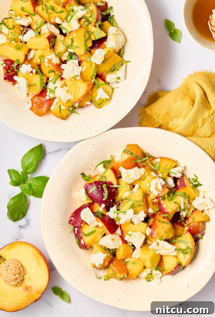 Refreshing Peach and Basil Salad 6 Peach salad ingredients beautifully mixed, creating a vibrant and fresh summer salad.