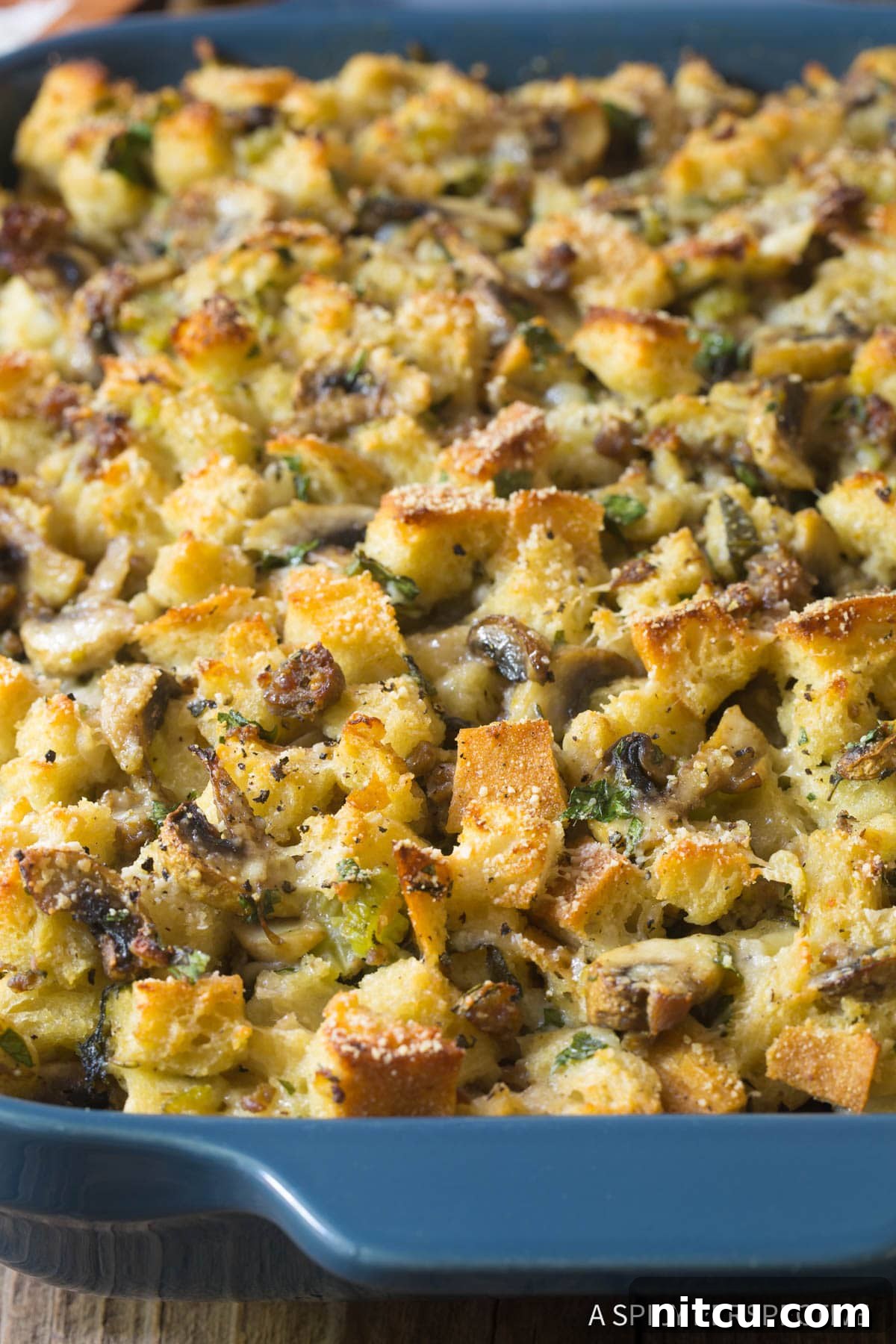 Savory Mushroom and Sausage Dressing 9 Large pieces of golden brown Mushroom Sausage Stuffing with fresh herbs