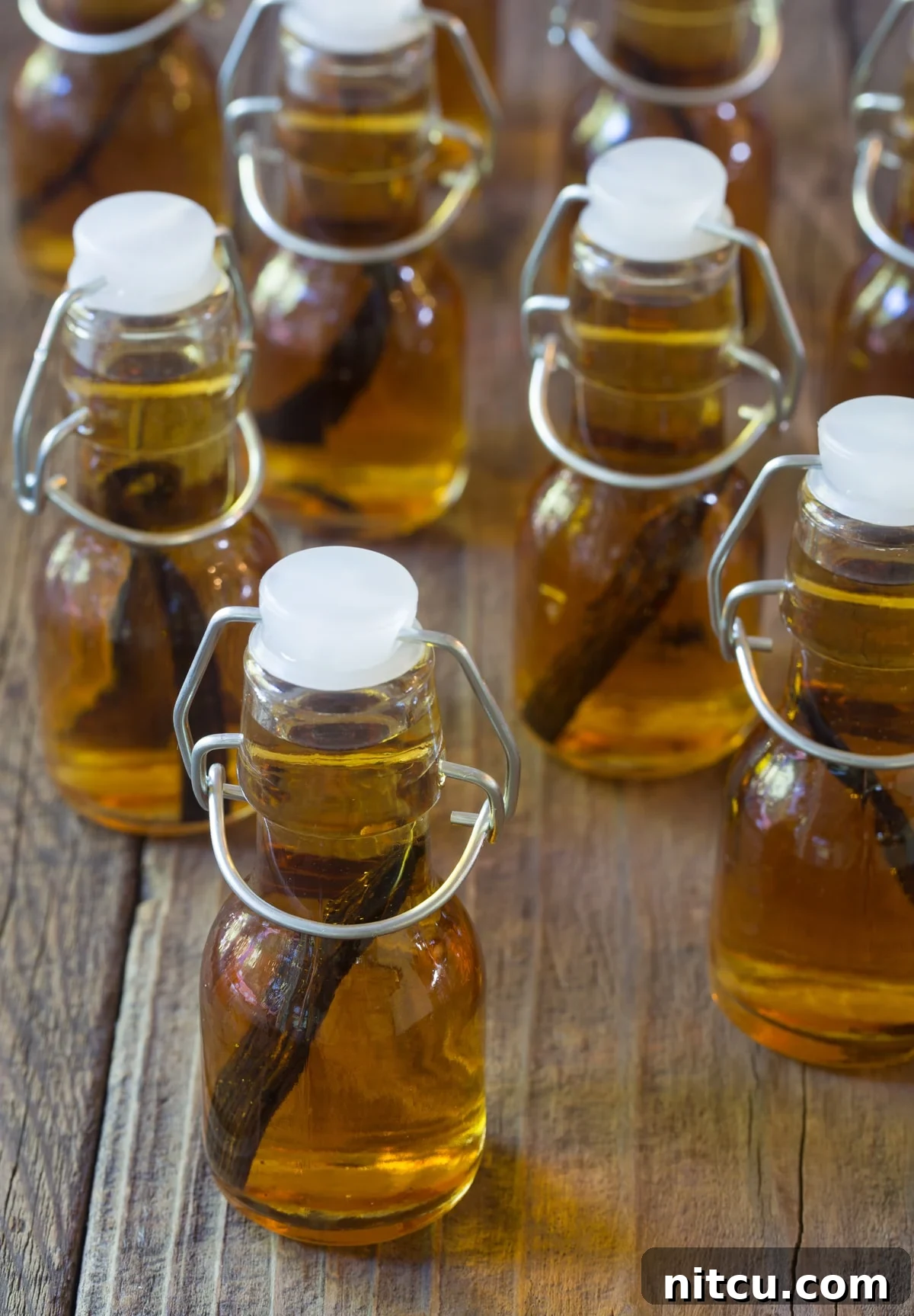 Artisan Bourbon Vanilla Extract 7 Small bottles of homemade bourbon vanilla extract.