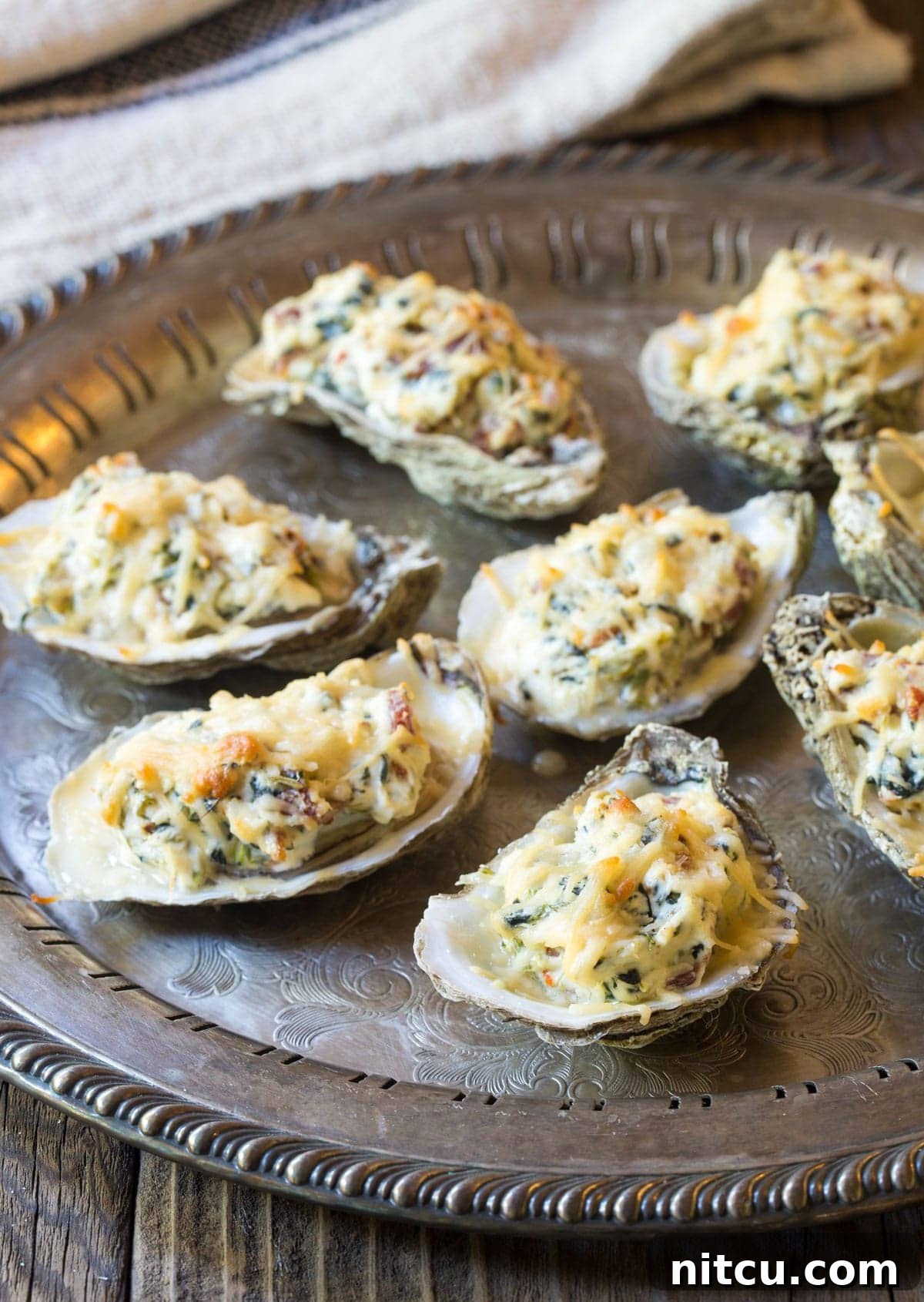 Baked Oysters Fromage 9 Best baked oysters recipe on a tray, topped with perfectly melted golden cheese