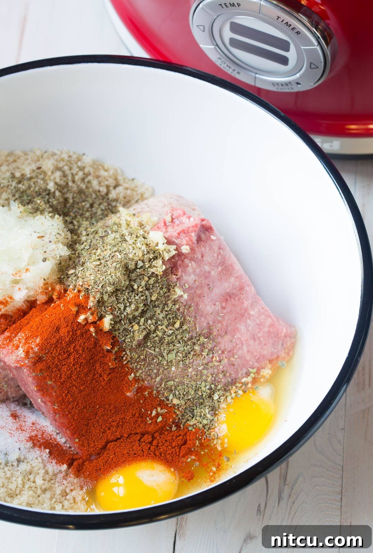 Crockpot Party Meatballs 5 Ingredients for homemade cocktail meatballs: ground meat, spices, eggs, and breadcrumbs