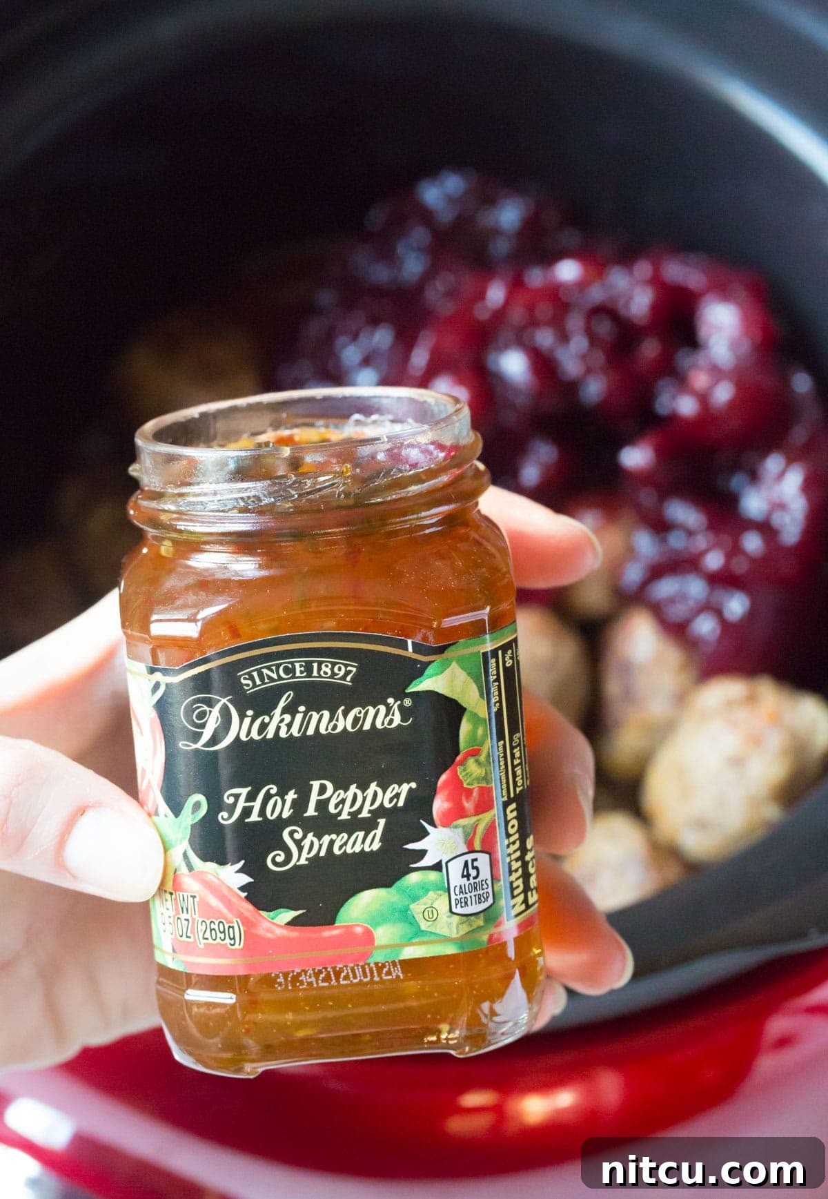 Crockpot Party Meatballs 8 Adding Dickinson's jalapeno jelly to the slow cooker for the cocktail meatballs