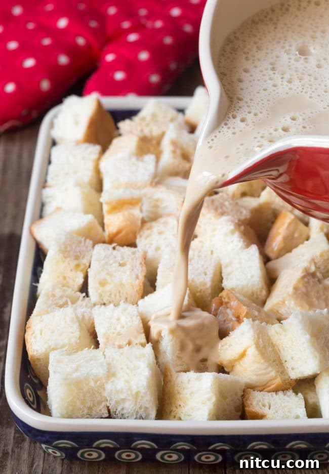 Espresso Bread Pudding Bliss 7 Pouring custard over bread cubes.